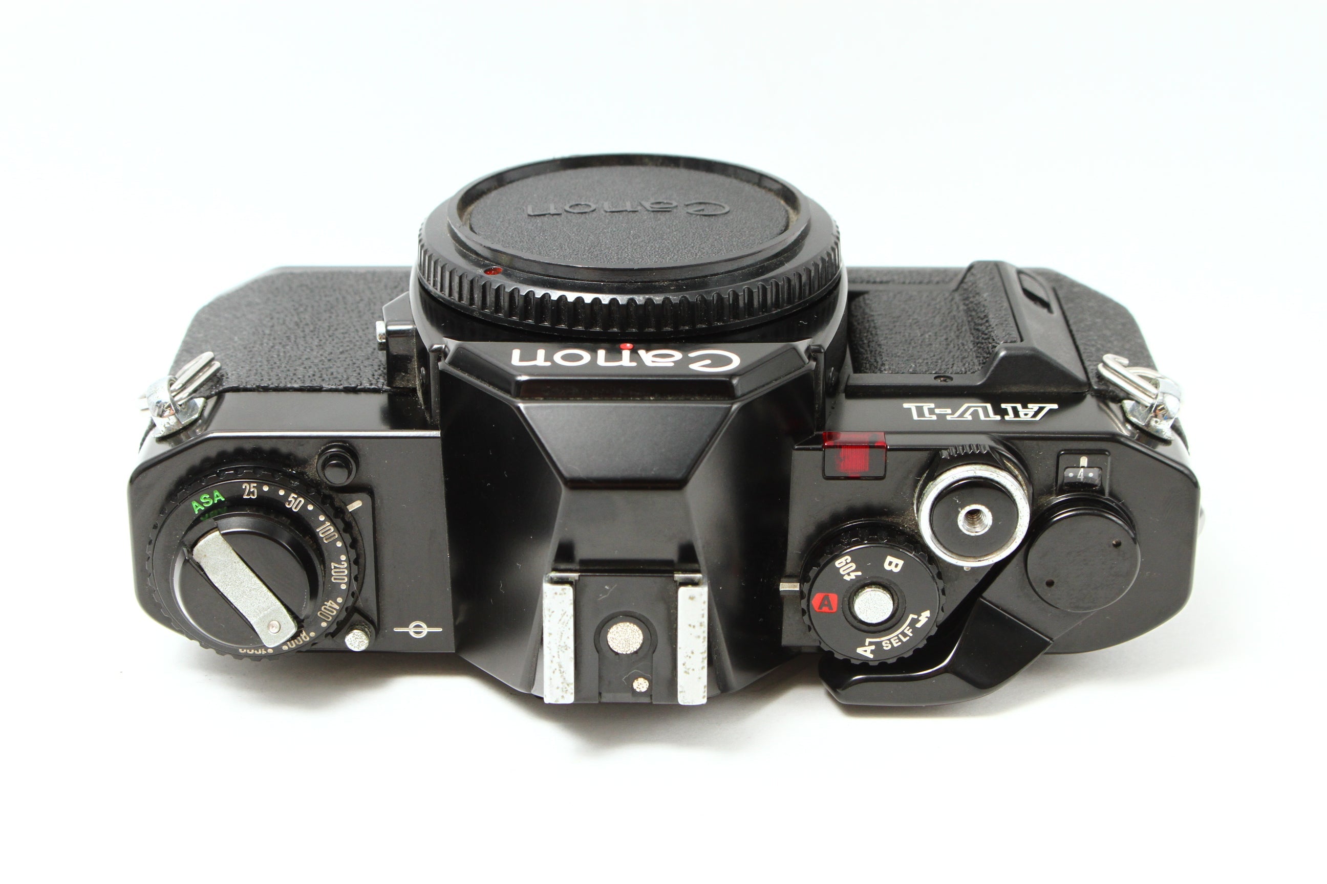 Canon AV-1 ブラック フィルムカメラ 一眼レフ – にっしんカメラ Nisshin Camera